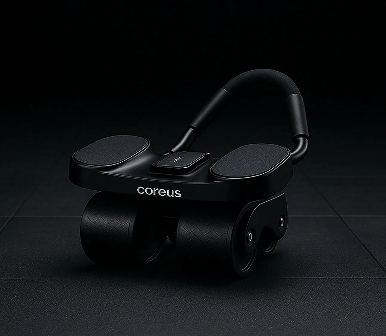 Black wheeled device with handle, labeled 'coreus', on a dark surface.